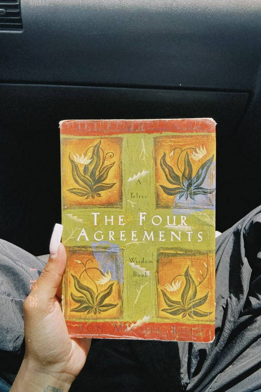 The Four Agreements: A Practical Guide to Personal Freedom by Miguel Ruiz